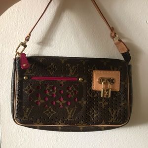 Rare LV perforated pochette with fuchsia interior!